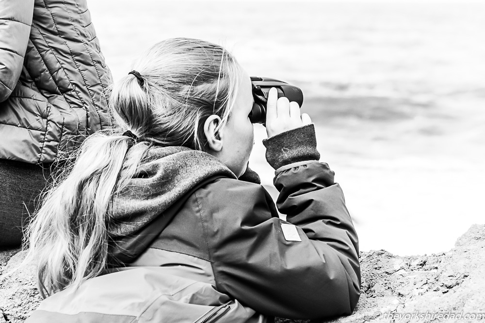 A girls using binoculars | The Yorkshire Dad of 4